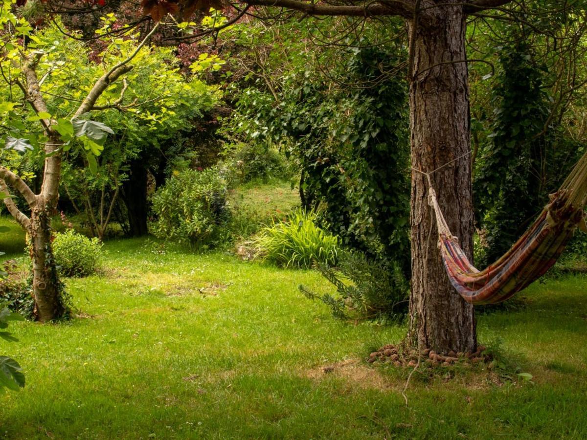 Une Suite Au Jardin Hyenville Exterior photo